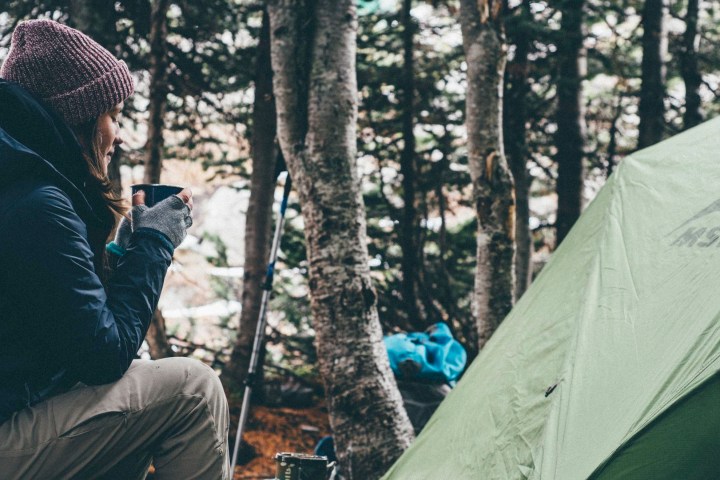 a man in a tent